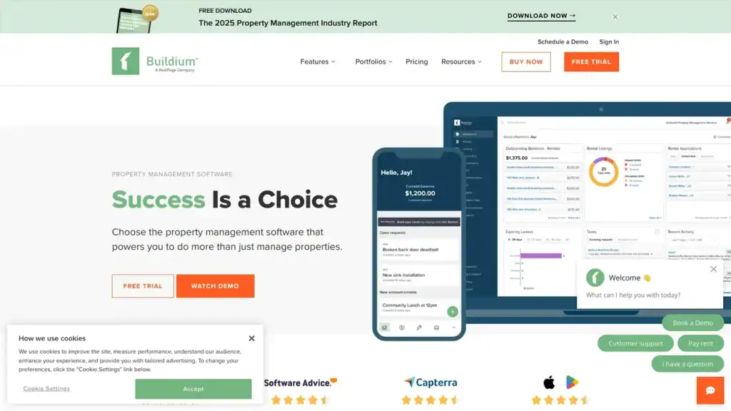 Buildium property management software homepage showing dashboard on desktop and mobile with free trial and demo options.